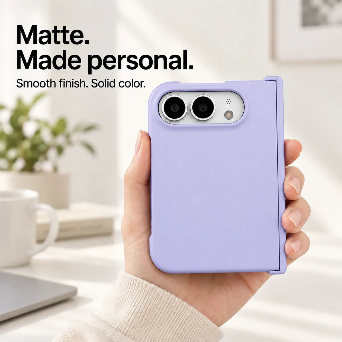 Light Purple matte iPhone Ultra case held in one hand, with a smooth solid-color rear shell and silver camera area. #color_Lilac Mist