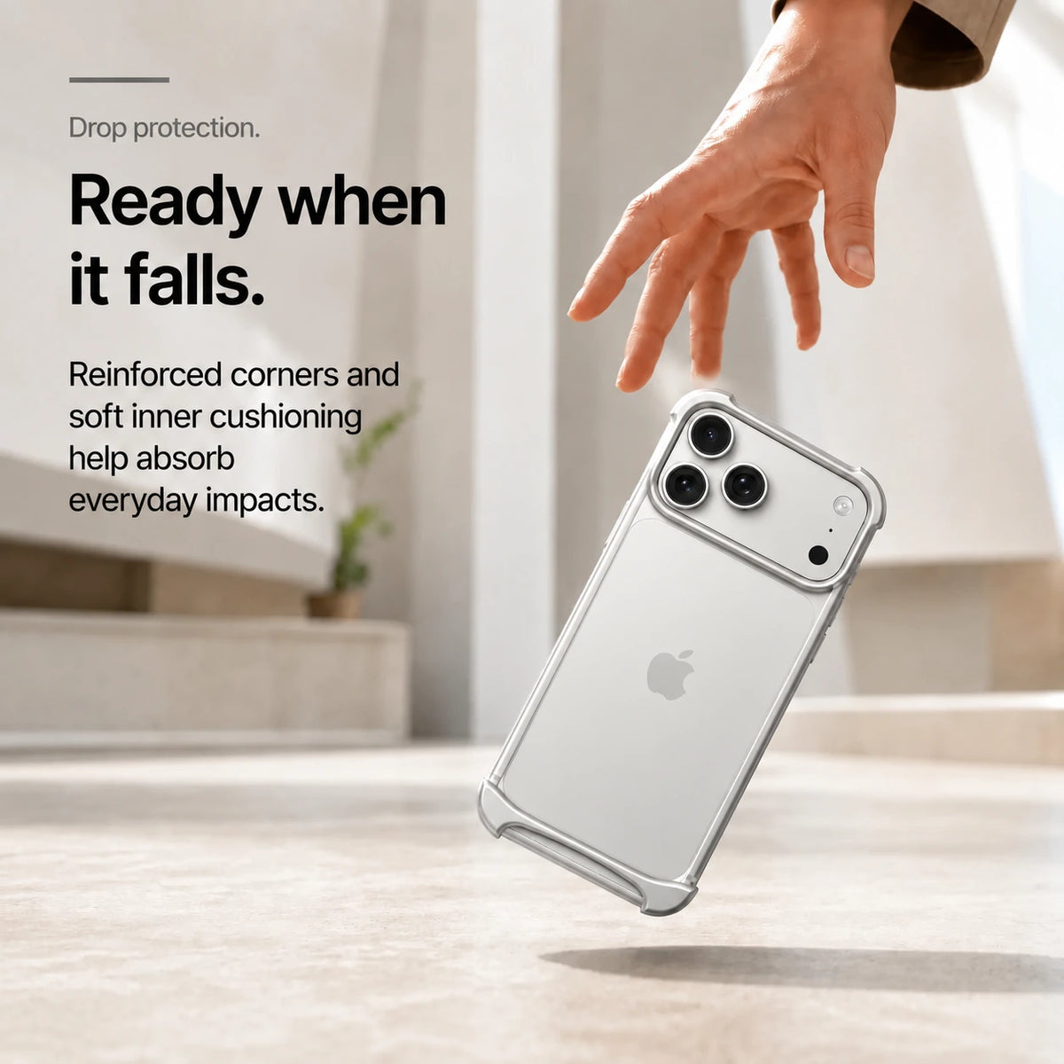 Silver open metal bumper phone case in a drop protection scene #color_Titanium Silver